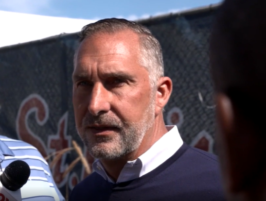 John Mozeliak explaining why he extended Marmol's contract in at a Spring Training game