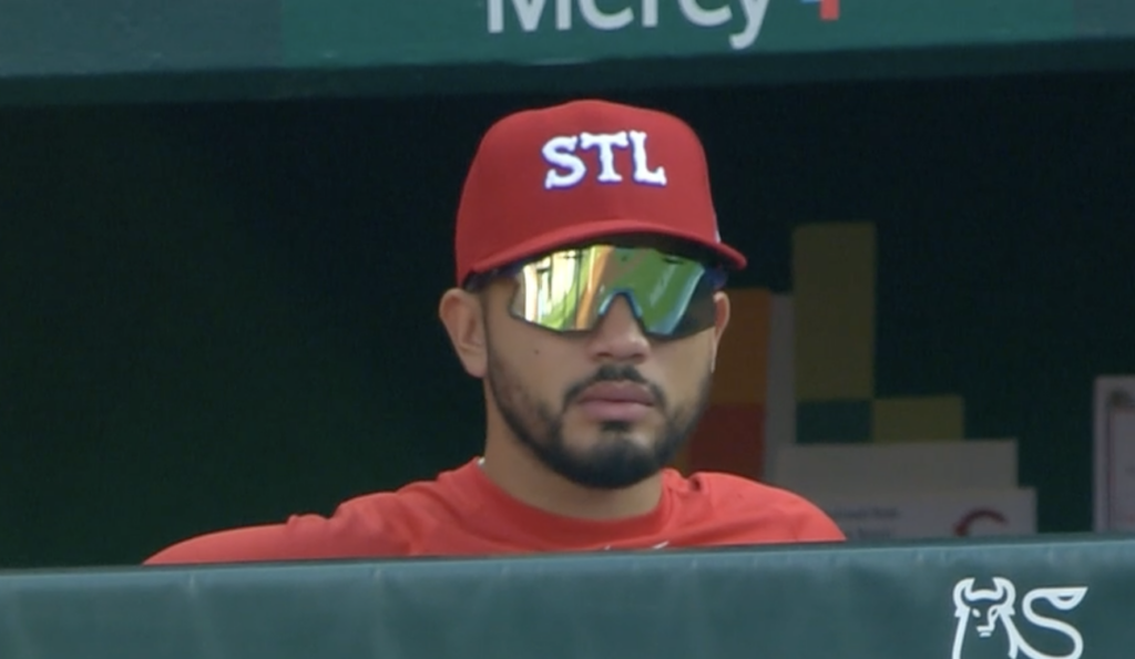Herrera - 1 - Redbird Report Injured Iván Herrera watching the Reds game from the Dugout