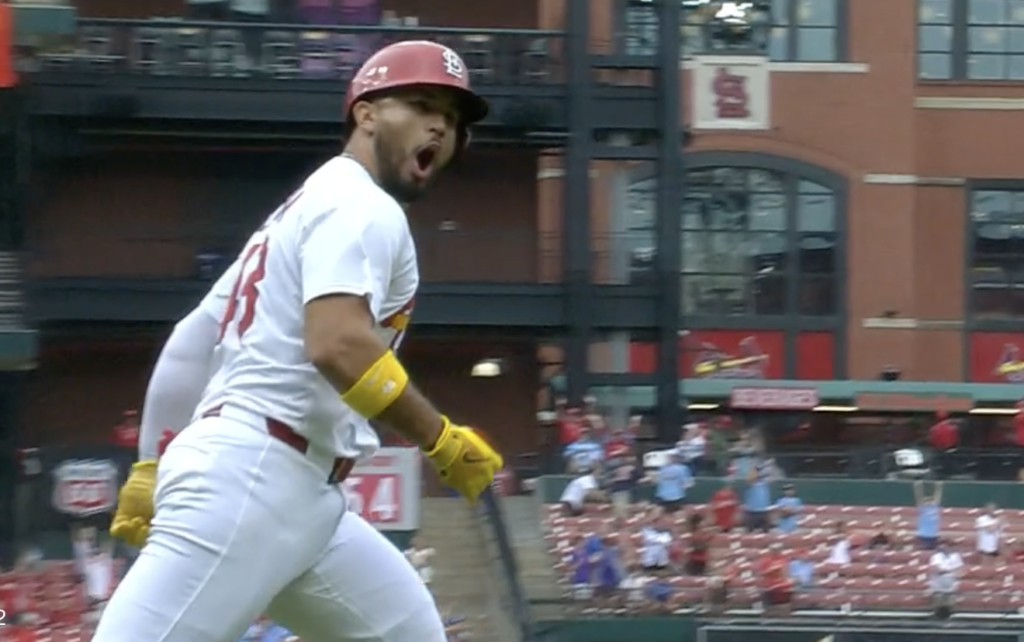 Iván Herrera rounding the bases