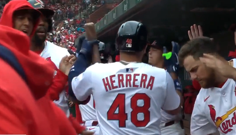 Iván Herrera - 18 - Redbird Report Iván Herrera being congratulated after a sacrifice fly